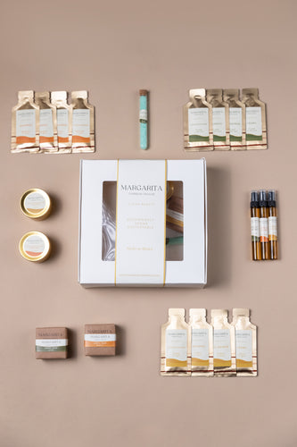 Kit premium de cuidado personal con 21 productos clean beauty para regalos corporativos de hospitalidad